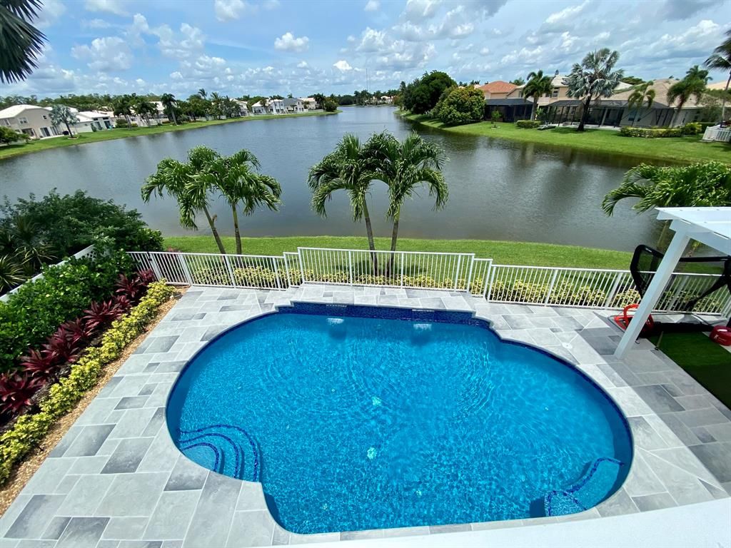 Photo of 6651 Marbletree Lane Ln, Lake Worth, FL 33467 (MLS # R10813526)