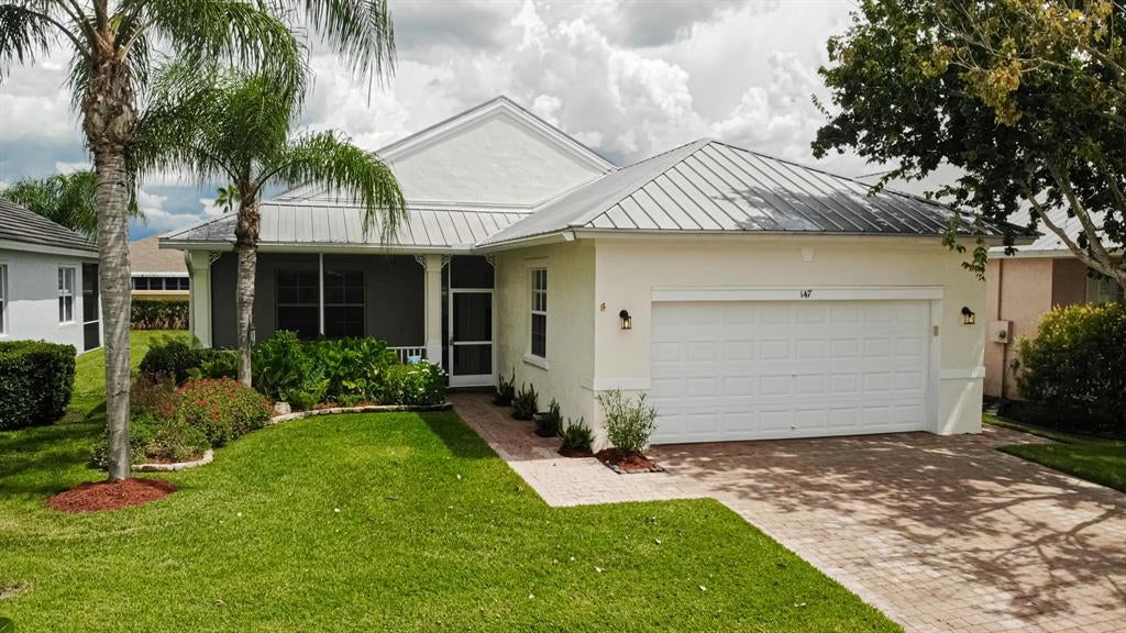 Photo of 147 NW Willow Grove Avenue Ave, Port St Lucie, FL 34986 (MLS # R10733597)