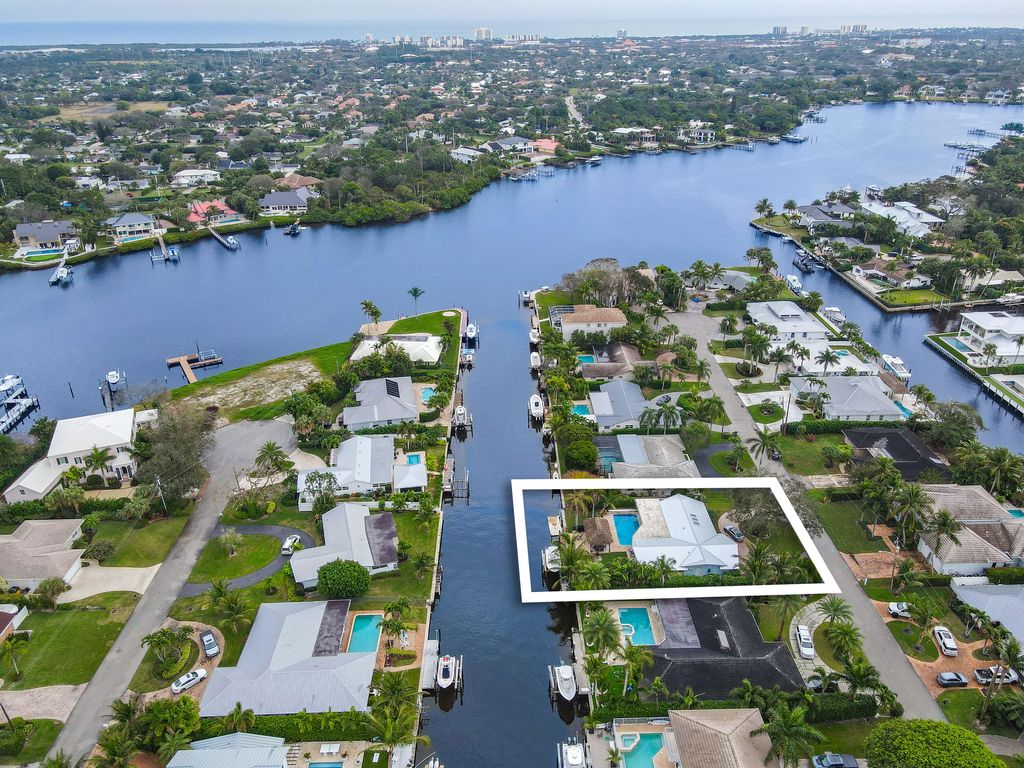 Photo of 15 Tradewinds Circle, Tequesta, FL 33469 (MLS # R10953162)