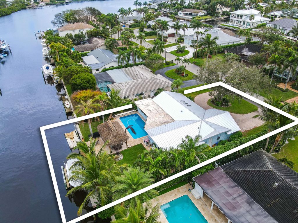 Photo of 15 Tradewinds Circle, Tequesta, FL 33469 (MLS # R10953162)