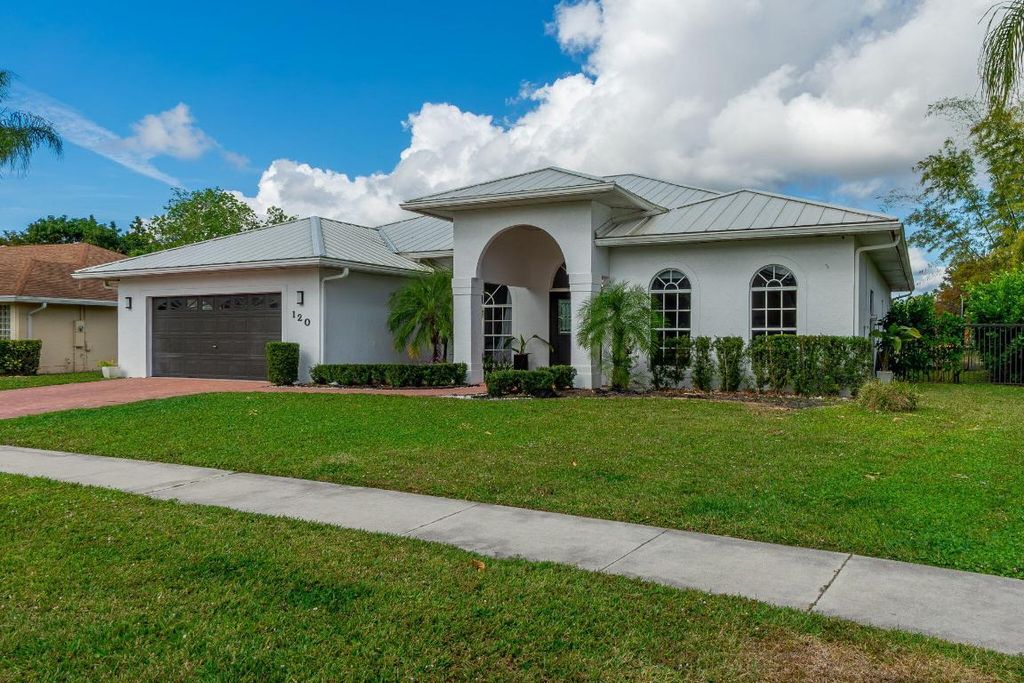 Photo of 120 Saratoga Boulevard W, Royal Palm Beach, FL 33411 (MLS # R11158597)