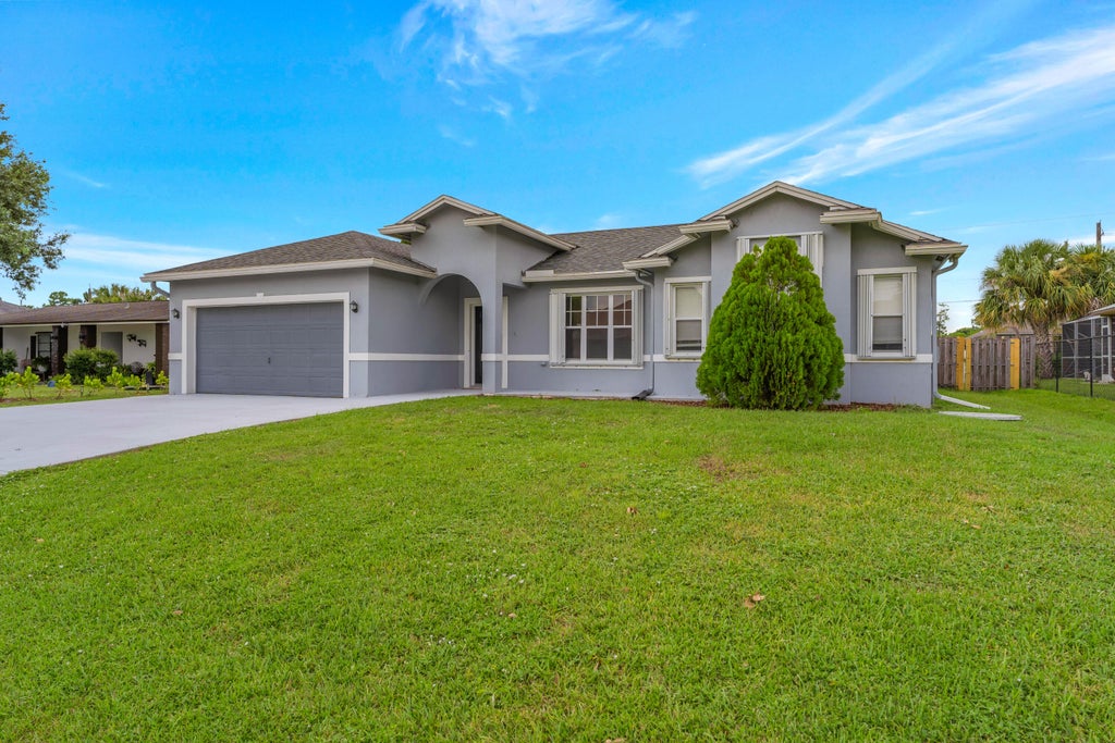 Photo of 2320 SW MADRID Road, Port Saint Lucie, FL 34953 (MLS # B26059417)