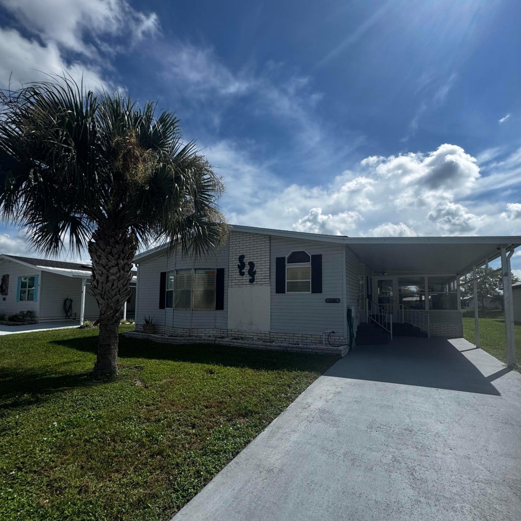 Photo of 6780 Dulce Real Avenue, Fort Pierce, FL 34951 (MLS # B26072488)