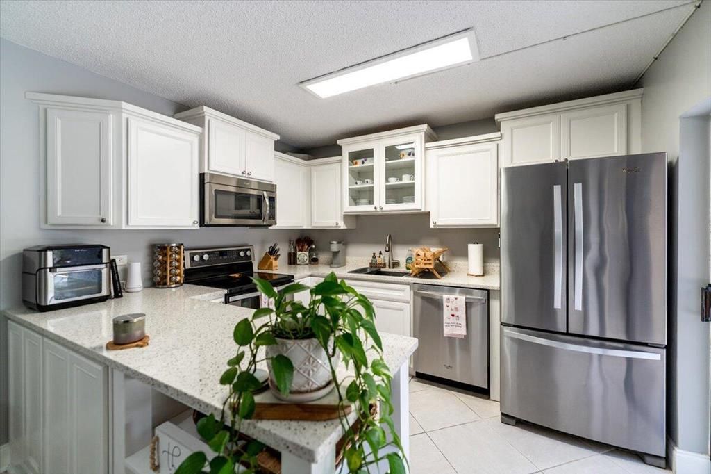 Photo of 230 2nd Terrace, Palm Beach Gardens, FL 33418 (MLS # R10874439)