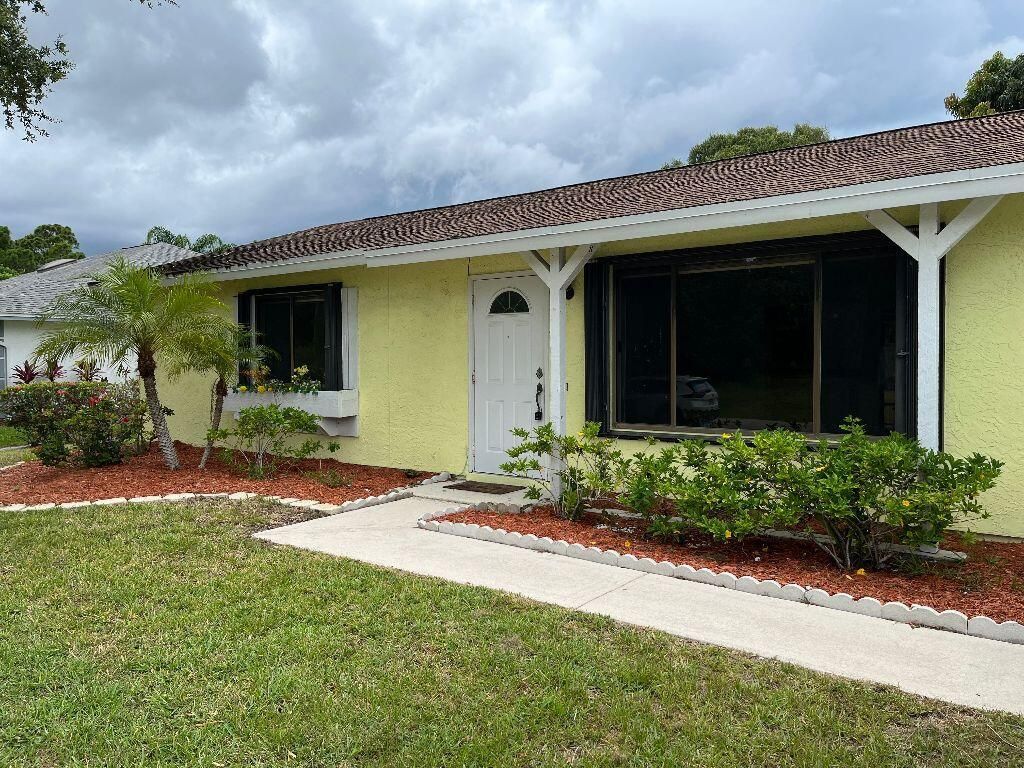 Photo of 2367 SE Manor Avenue Ave, Port Saint Lucie, FL 34952 (MLS # R10811359)