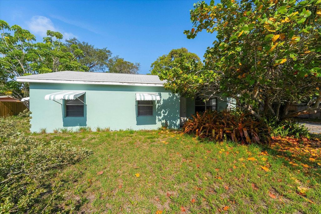 Photo of 1050 NE Wright Avenue, Jensen Beach, FL 34957 (MLS # R10994347)
