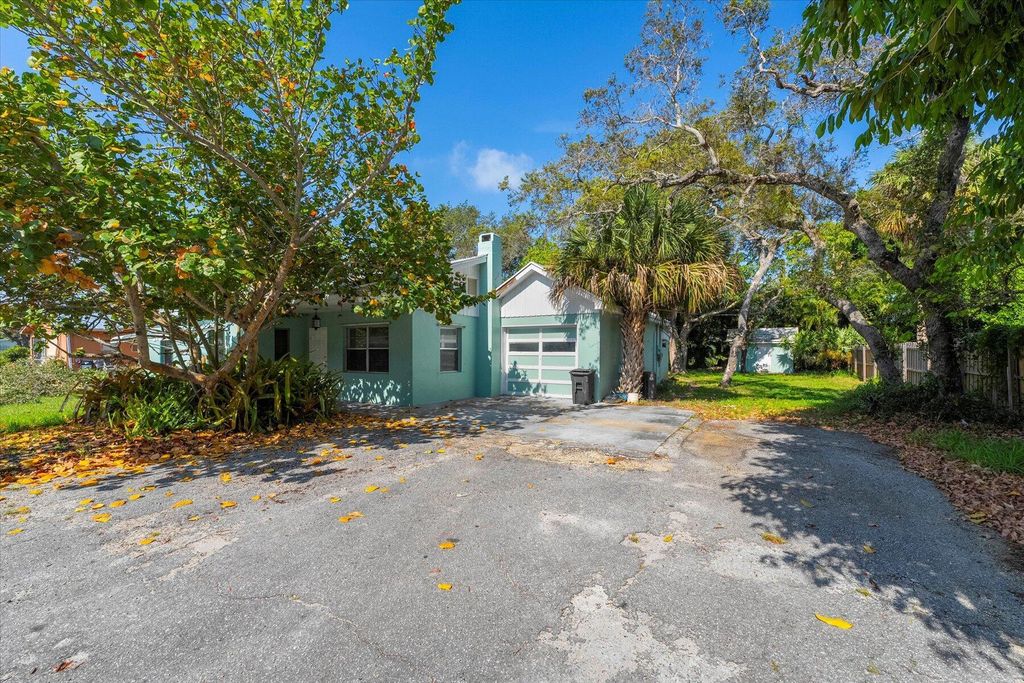 Photo of 1050 NE Wright Avenue, Jensen Beach, FL 34957 (MLS # R10994347)