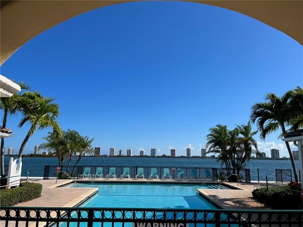 Photo of 1140 Lake Shore Dr, Lake Park, FL 33403 (MLS # F10367060)