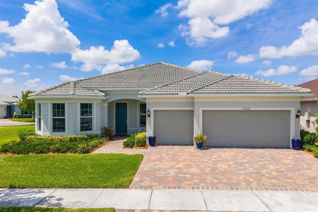 Photo of 13004 SW Gingerline Dr, Port Saint Lucie, FL 34987 (MLS # B26021469)