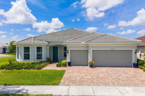Photo of 13004 SW Gingerline Dr, Port Saint Lucie, FL 34987 (MLS # B26021469)