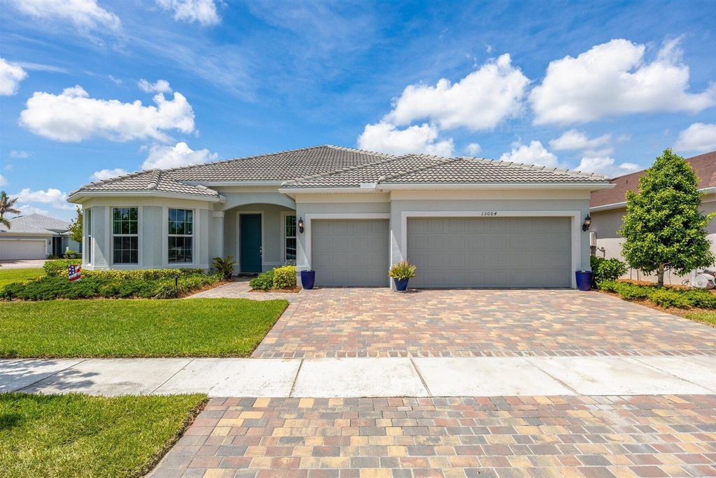 Photo of 13004 SW Gingerline Dr, Port Saint Lucie, FL 34987 (MLS # B26021469)
