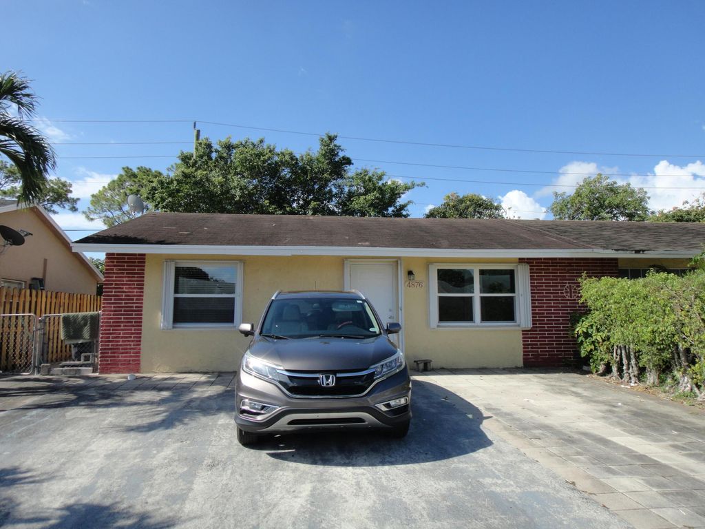 Photo of 4876 Saratoga Road, West Palm Beach, FL 33415 (MLS # B26029063)