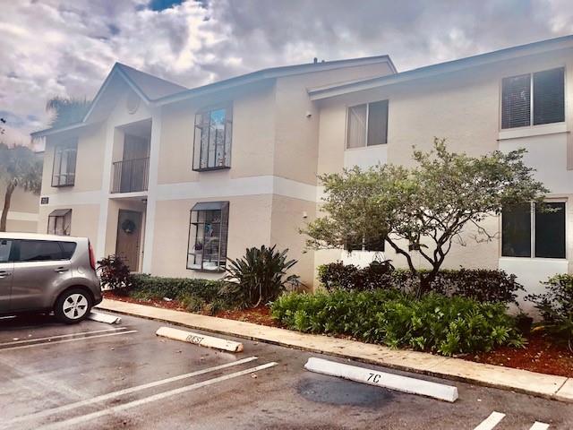 Photo of 717 Gardens Dr #201, Pompano Beach, FL 33069 (MLS # F10308833)