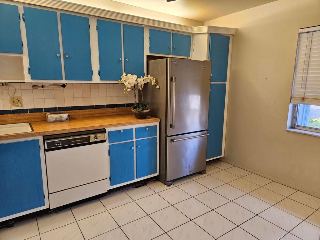 Photo of 2886 Fernley Drive E #73, West Palm Beach, FL 33415 (MLS # R11152354)