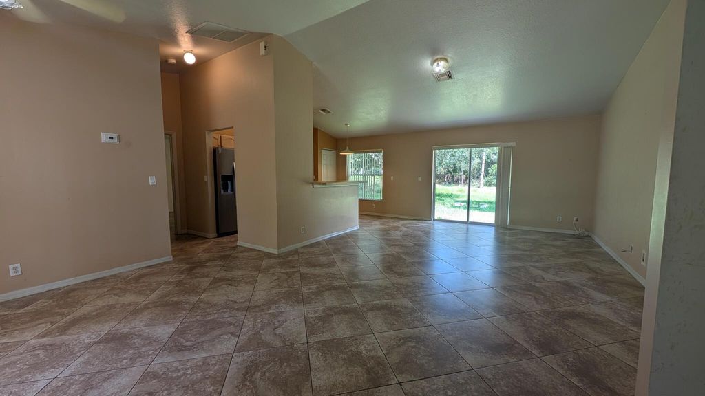 Photo of 1500 SW Bermel Avenue, Port Saint Lucie, FL 34953 (MLS # R11091751)