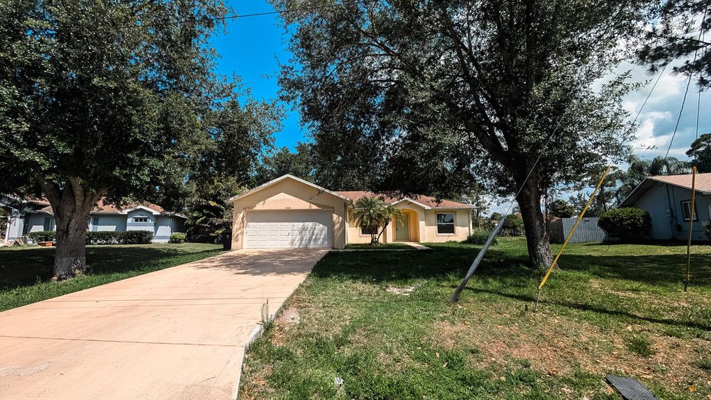 Photo of 1500 SW Bermel Avenue, Port Saint Lucie, FL 34953 (MLS # R11091751)