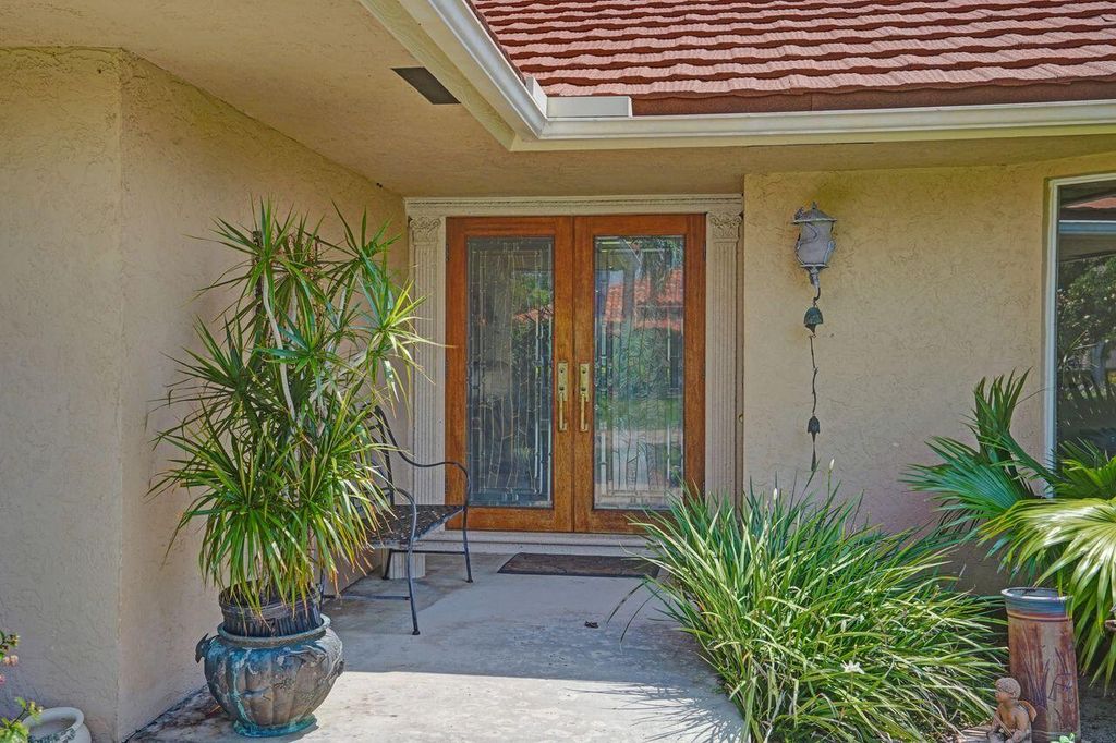 Photo of 7 Marlwood Lane, Palm Beach Gardens, FL 33418 (MLS # B26023260)