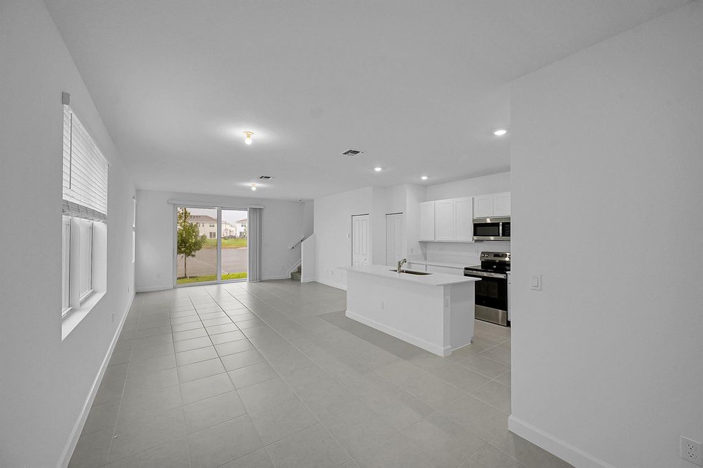 Photo of 548 SE Rivergrass Street, Port Saint Lucie, FL 34984 (MLS # R11120811)