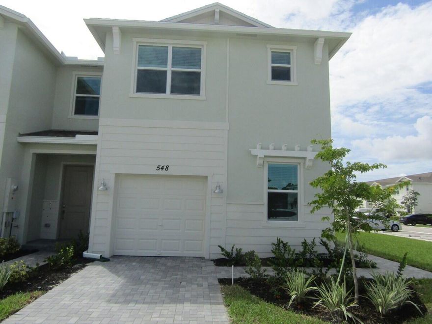 Brand new townhome, just built, 3/2 & 1/2 bath with a office space on the 1st floor.Impact Windows .This two-story townhome showcases a contemporary open design among the first-floor kitchen, dining room and living room to promote seamless transitions between spaces. Through sliding glass doors is a terrace for outdoor relaxation. Upstairs caters to all three bedrooms, including the spacious owner's suite complemented by an adjoining bathroom and oversized walk-in closet. Prices, dimensions and features may vary and are subject to change.