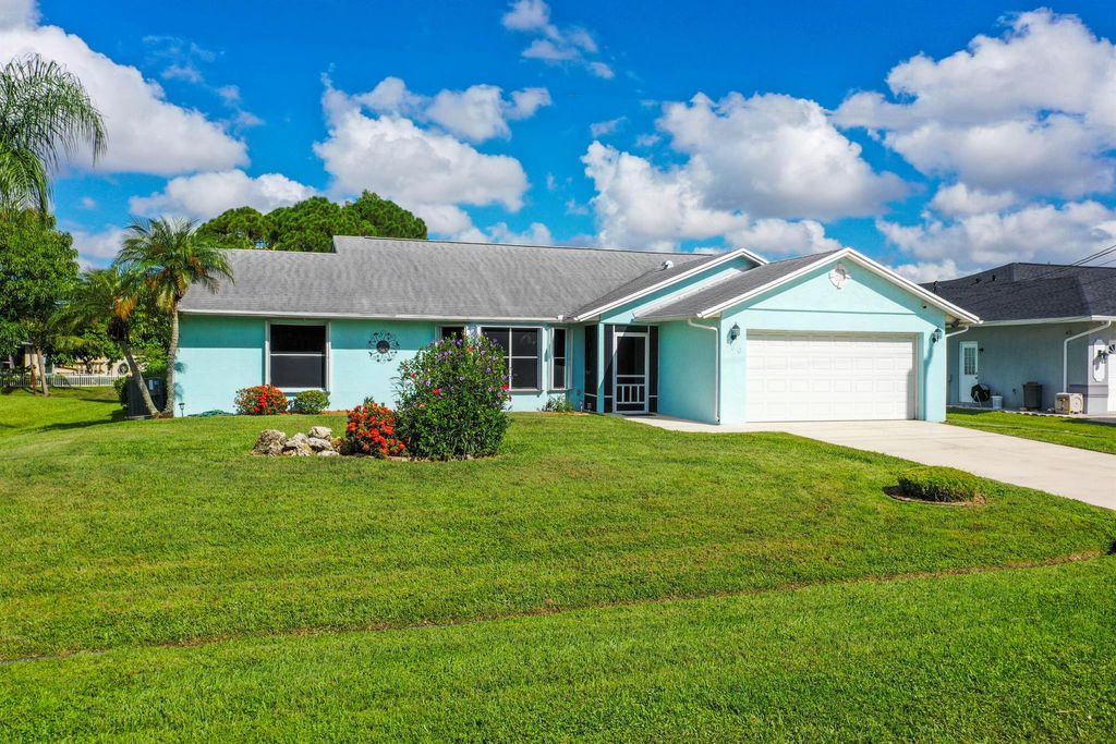 Photo of 560 SE Nome Drive, Port Saint Lucie, FL 34984 (MLS # R11117116)