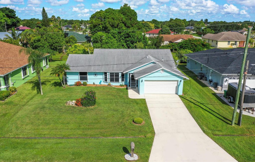 Photo of 560 SE Nome Drive, Port Saint Lucie, FL 34984 (MLS # R11117116)