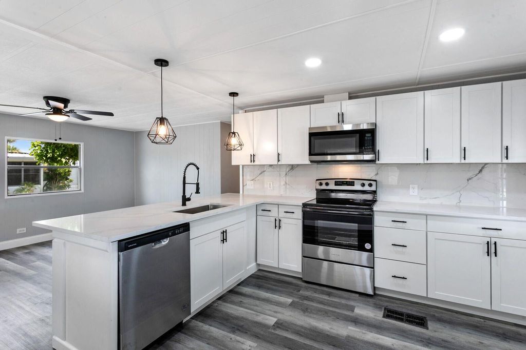 Photo of 56011 Amparo Bay, Boynton Beach, FL 33436 (MLS # R11112444)