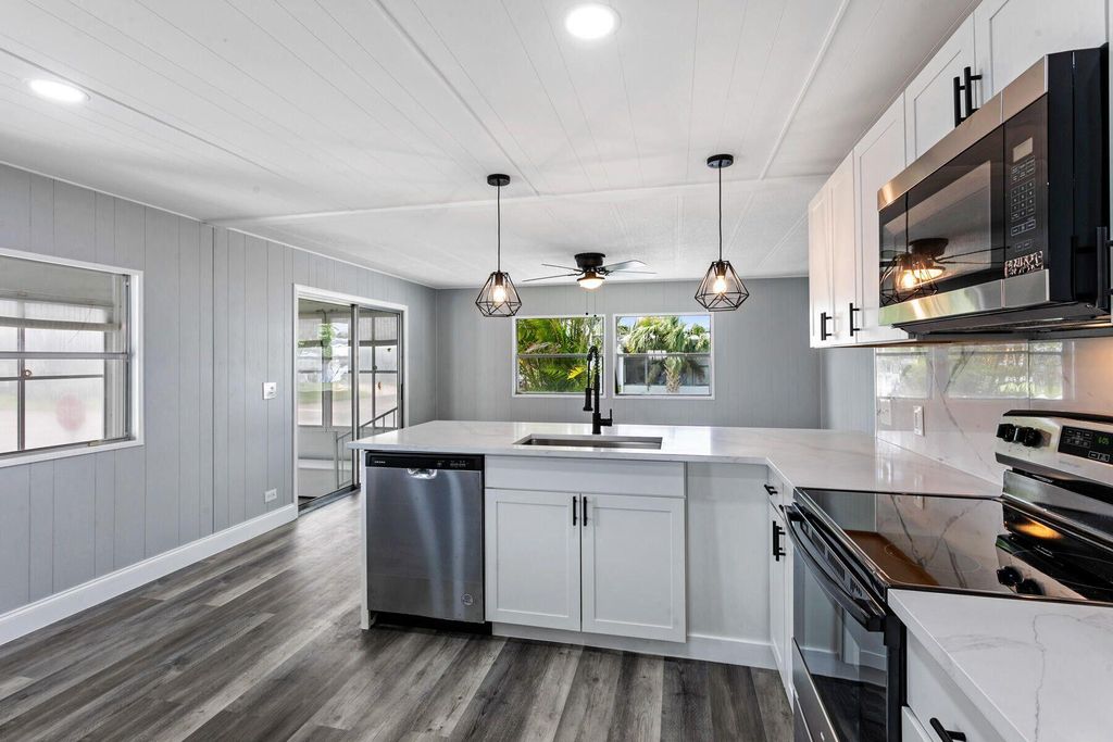 Photo of 56011 Amparo Bay, Boynton Beach, FL 33436 (MLS # R11112444)