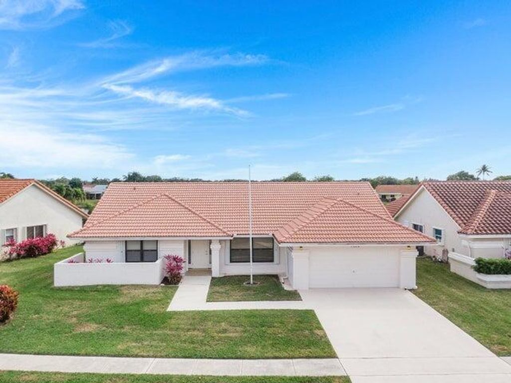 Photo of 9525 El Clair Ranch Road, Boynton Beach, FL 33437 (MLS # R11151349)