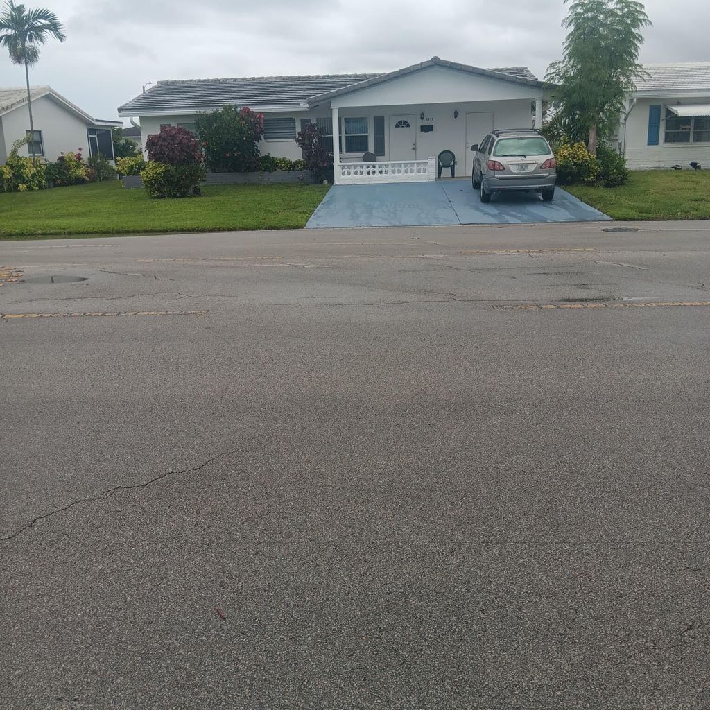 Photo of 5715 NW 84th Terrace, Tamarac, FL 33321 (MLS # B26036958)