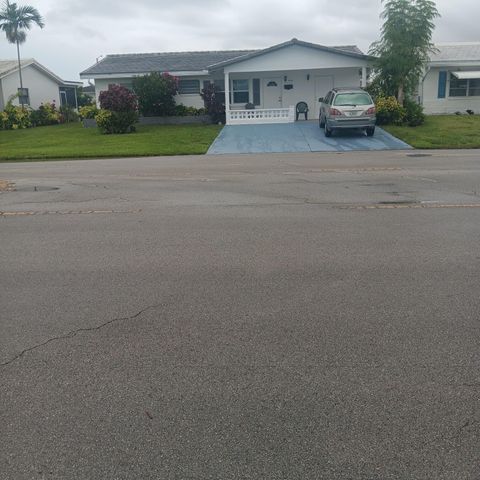Photo of 5715 NW 84th Terrace, Tamarac, FL 33321 (MLS # B26036958)