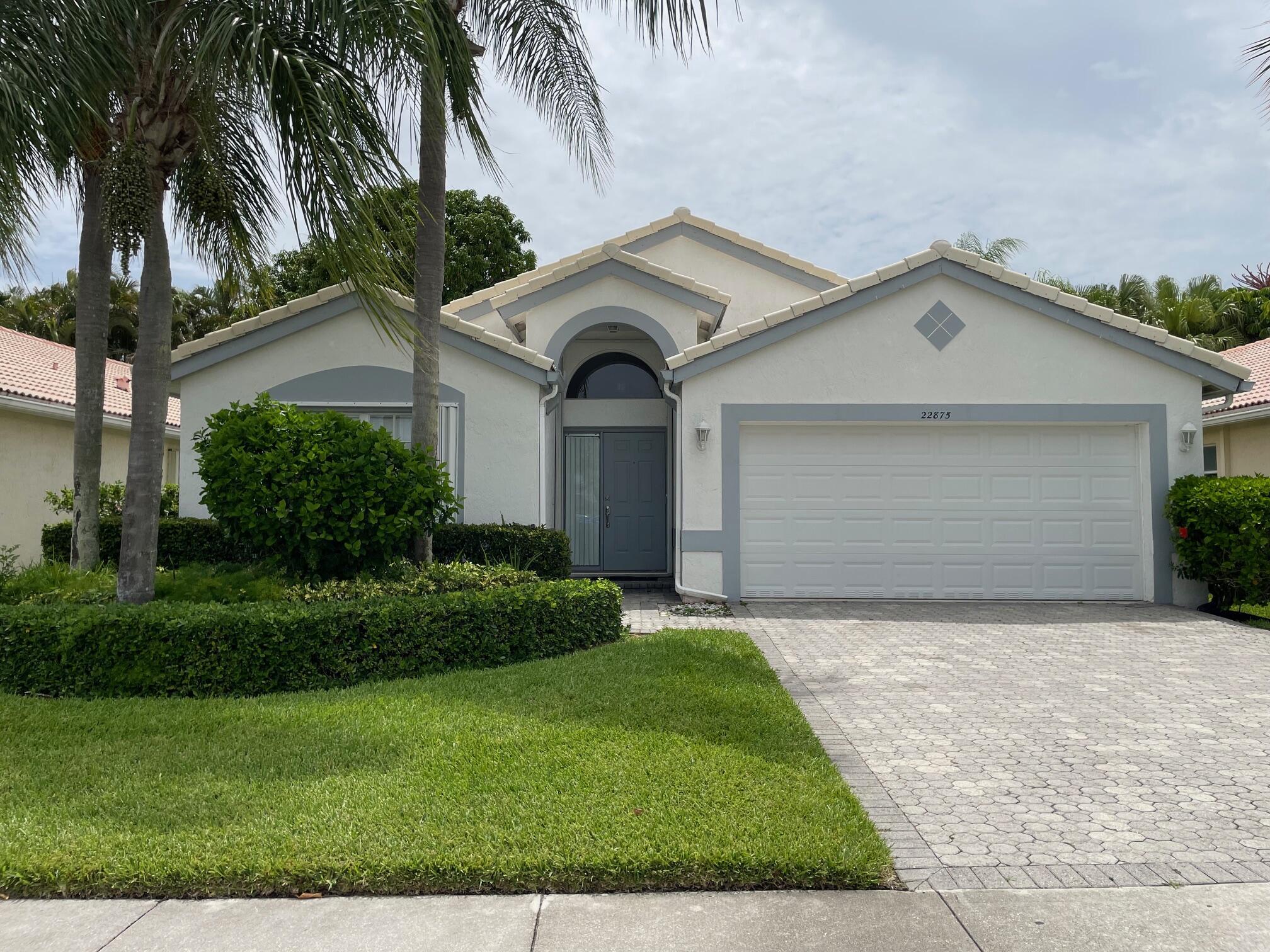 Spacious, light & open. Ample kitchen. Formal Living and Dining rooms PLUS a Family Room. 3 bedrooms and 2 bathrooms w/split plan for extra privacy. Master Suite has 2 large walk-in closets, double vanities, soaking tub & separate shower. New A/C ready for the summer. Large, tiled, screened & covered patio. Two-car garage. Accordion shutters. Backyard is hedged for privacy. Convenient access to community amenities through a trellised archway in the backyard. Gated community with pool, clubhouse, fitness room & 2 lighted clay tennis courts. Crescent Lakes is one of Boca's best kept secrets!