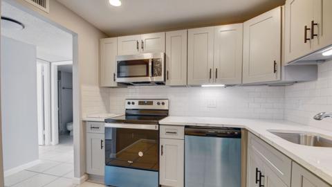 Meticulously maintained 2BR/2BA condo in gated Breakwaters of the Palm Beaches. Can be sold with current tenant in place for immediate rental income or delivered vacant for buyers wanting to occupy. This condo boasts an open floor plan, spacious bedrooms, and private balcony. Community offers pool, tennis, clubhouse, fitness center, and a fitness trail. Centrally located in West Palm Beach, this is a prime location! Just 2 miles to Downtown West Palm Beach and The Square, 4 miles to Palm Beach International Airport, 5 miles to Palm Beach Island & beaches, and minutes from major highways for easy commuting. Surrounded by shopping, dining, entertainment, and top employers, making it ideal for strong rental demand.