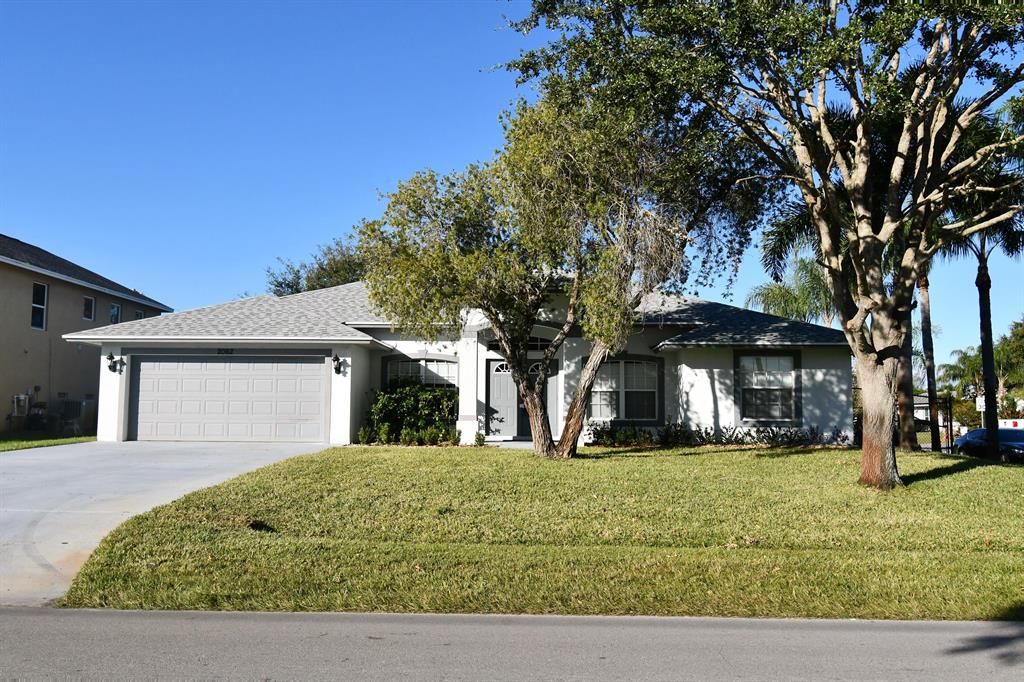 Photo of 2062 SW Sunglow Street, Port Saint Lucie, FL 34953 (MLS # R10681129)