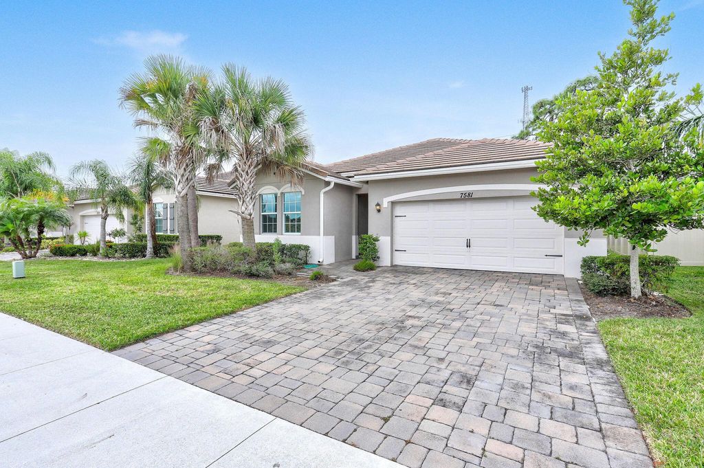 Photo of 7581 SW Harbor Cove Drive, Stuart, FL 34997 (MLS # R11039134)