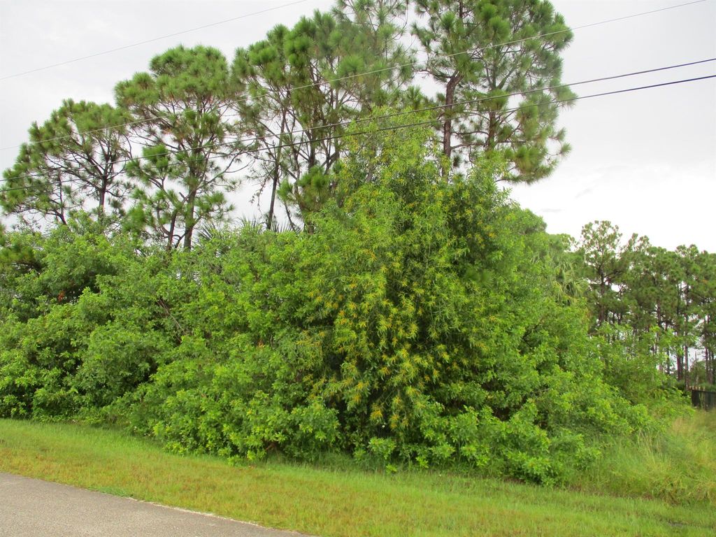 Photo of 5721 NW Wesley Road, Port St Lucie, FL 34986 (MLS # R10924724)