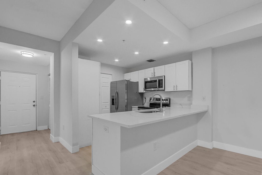 Photo of 2916 TUSCANY Court #302, Palm Beach Gardens, FL 33410 (MLS # B26084970)