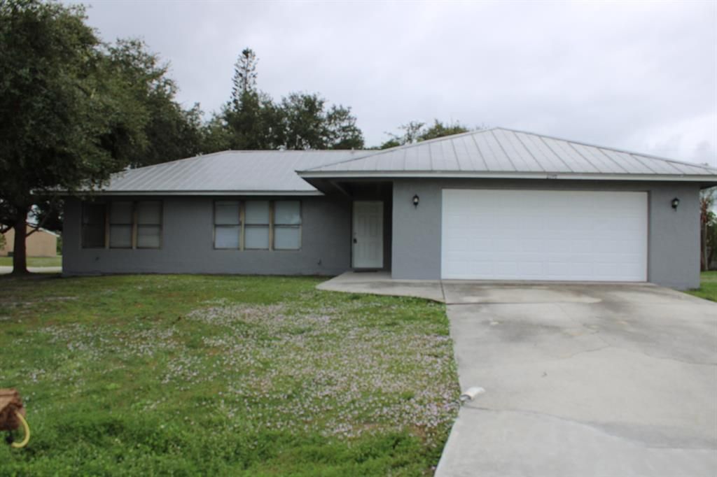 Photo of 2196 SE Sunflower Street, Port Saint Lucie, FL 34952 (MLS # R10760372)