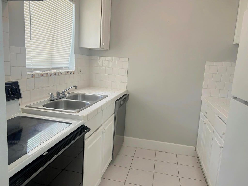 Photo of 6074 Forest Hill Boulevard #108, West Palm Beach, FL 33415 (MLS # R11113643)