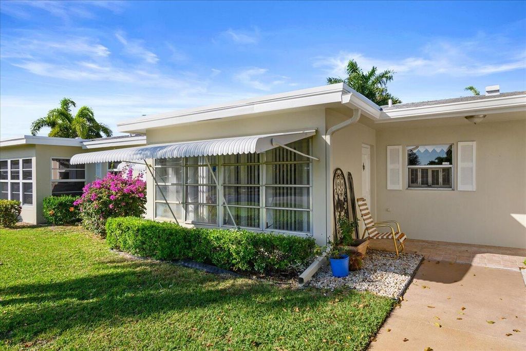 Photo of 301 Country Lane #B, Boynton Beach, FL 33435 (MLS # R10863125)