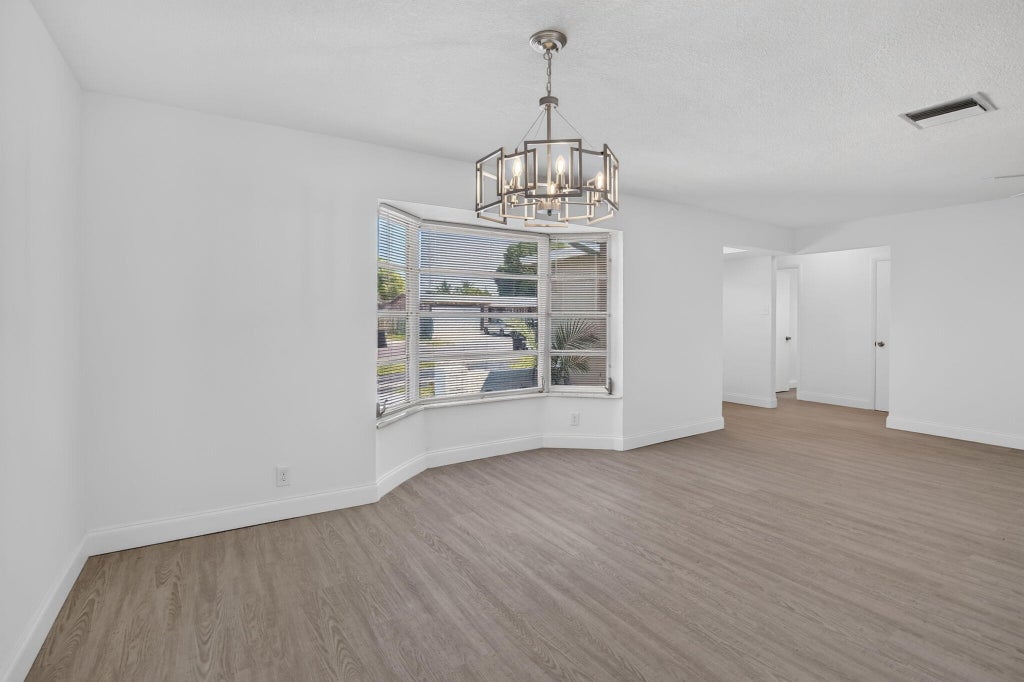 Photo of 3390 NW 42nd Street, Lauderdale Lakes, FL 33309 (MLS # B26071144)