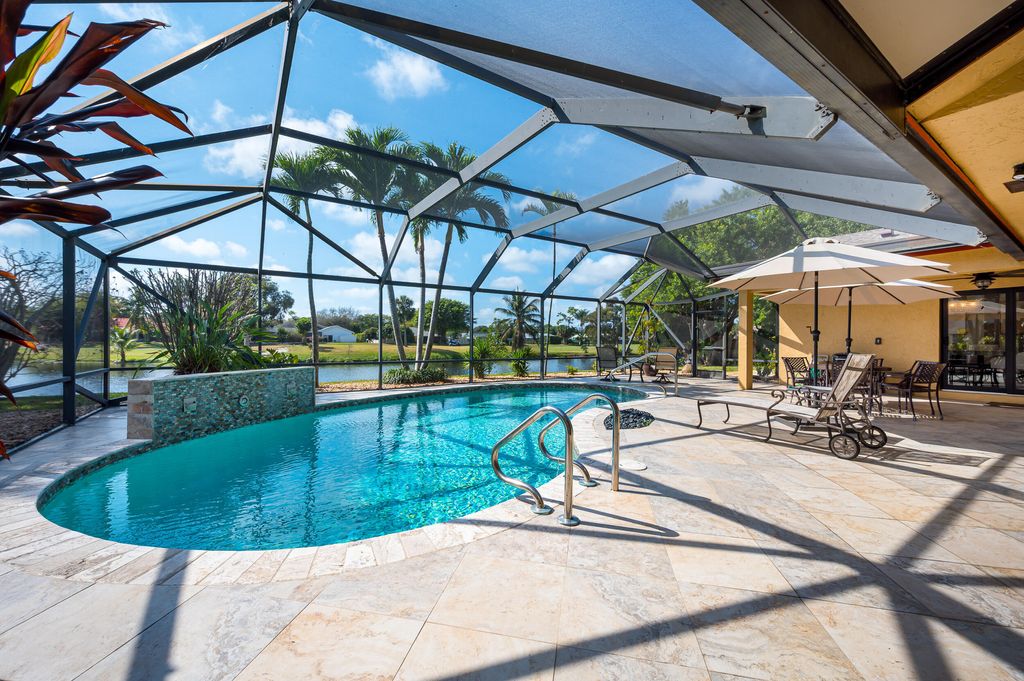 Photo of 3250 Lakeview Boulevard, Delray Beach, FL 33445 (MLS # B26011100)