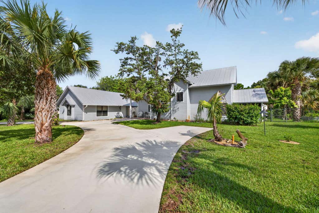 Photo of 3247 SW BESSEY CREEK Trail, Palm City, FL 34990 (MLS # B26059550)