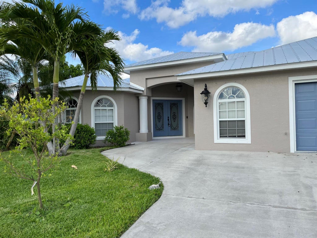 Photo of 3181 SW Armucher Street, Port St Lucie, FL 34953 (MLS # R10902301)