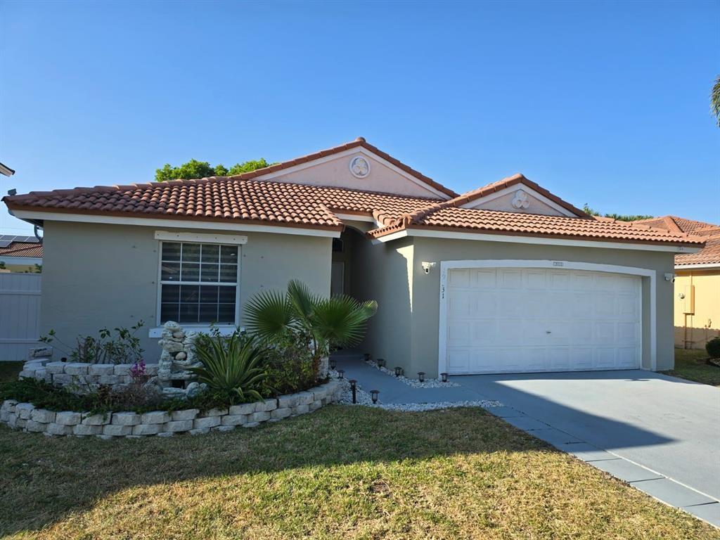 Available immediately! Spacious and bright 3 Bedrooms & 2 Bathrooms Single Home with a double car garage and spacious fenced yard with a Tiki-hut & a jacuzzi. In the Gated Community of Estancia in Pembroke Pines! This community features pools and a park. It is perfectly located, near distance to well-known schools, supermarkets, fitness centers, shopping centers, restaurants, movies, hospitals, major roads, etc. FAST APPROVAL! Schedule Your Showing Now!