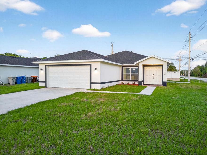 Brand new 3/2/2 on a corner lot in Vero Lake Estates. No HOA, no restrictions, and finishes that stand out. Impact Windows, high ceilings, open concept living with formal and informal spaces you can set up to fit your life, and a kitchen worth talking about! Quartz countertops, waterfall island, deep sink, and black S/S appliances that pull it all together. The primary suite has two walk-in closets, split vanities with plenty of counter space, and a frameless shower tiled to ceiling + rain head. Patio Slab for outdoor entertaining & just close to I-95, Publix, Vero Beach Outlets, and Quail Valley Golf Club. Vero's beaches are right down the road. Move in ready today.
