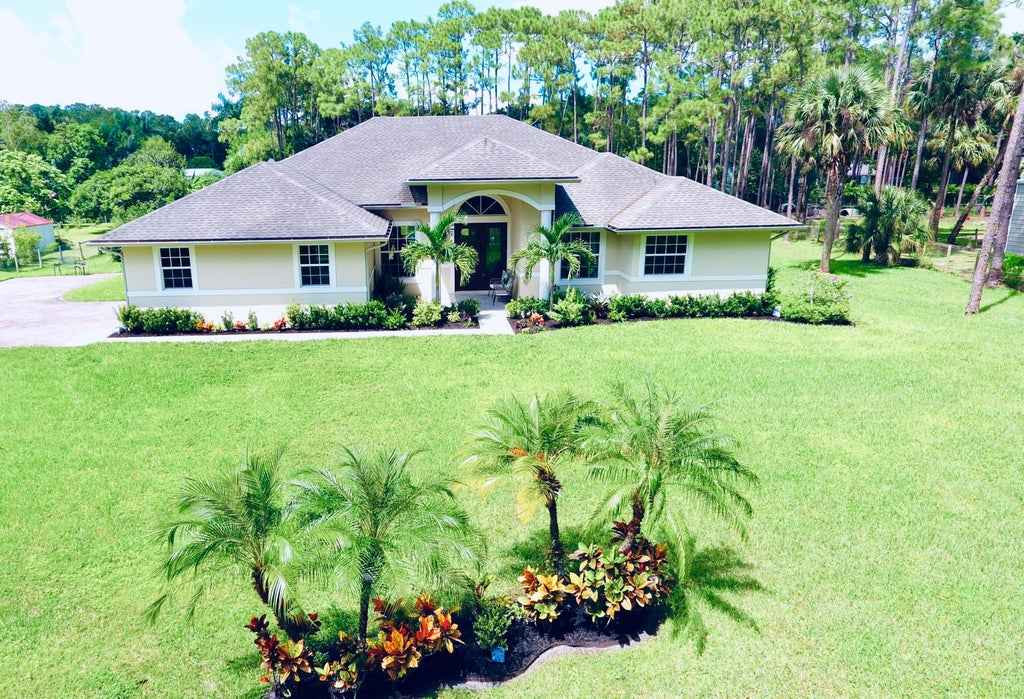 Photo of 11245 153rd Court N, Jupiter, FL 33478 (MLS # R11019057)