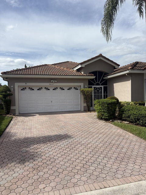 Photo of 9815 Lemonwood Drive, Boynton Beach, FL 33437 (MLS # B26042169)