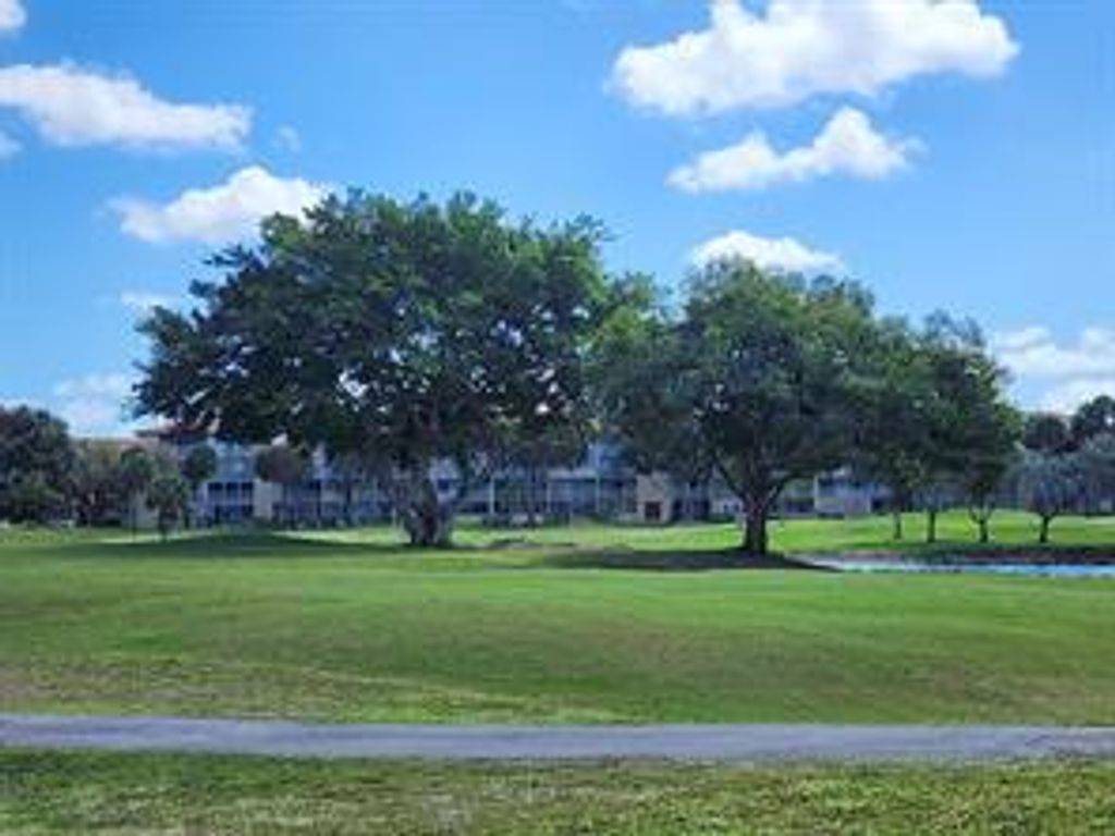 Photo of 13550 SW 6th Court #103a, Pembroke Pines, FL 33027 (MLS # B26020659)