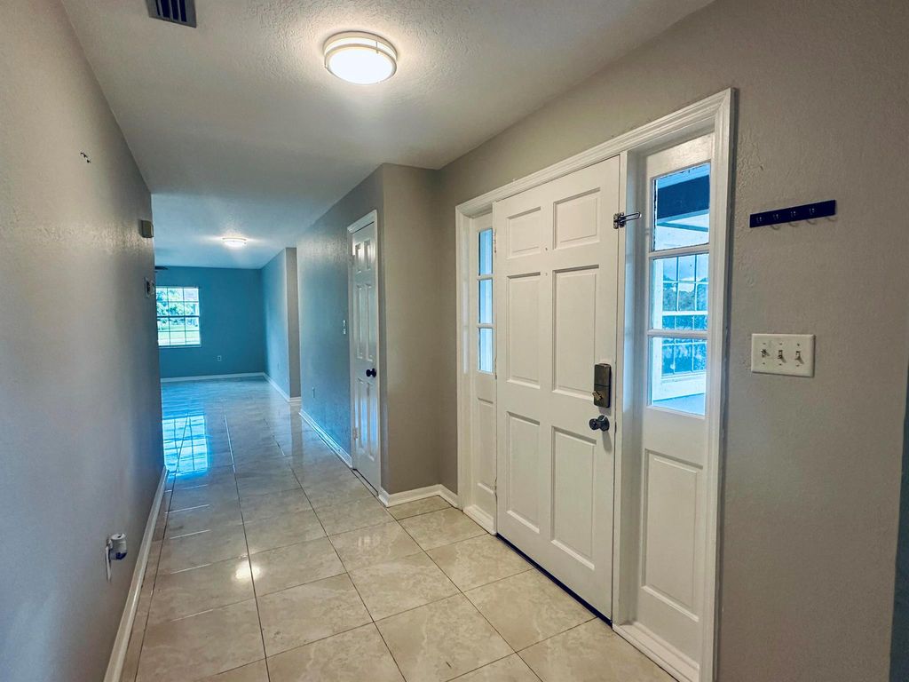 Photo of 2118 SE Morningside Blvd, Port Saint Lucie, FL 34952 (MLS # R11101688)