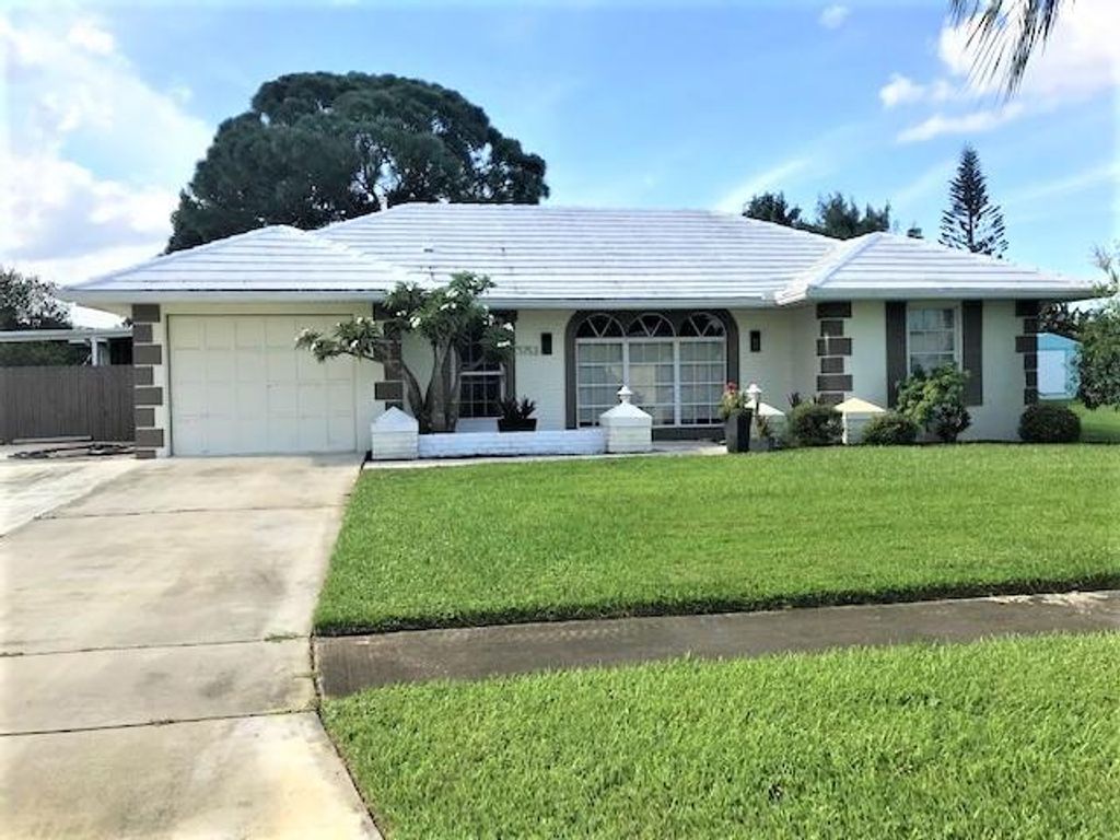 Photo of 1753 SE Adair Road, Port Saint Lucie, FL 34952 (MLS # R10754202)